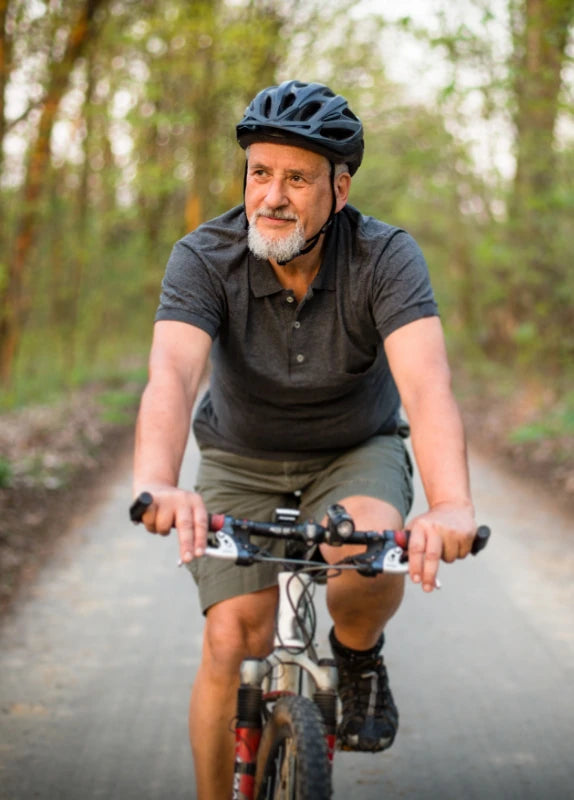 Older man riding his bike