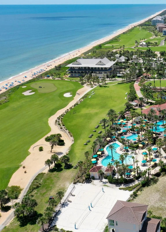 Top view photo of beach side golf course