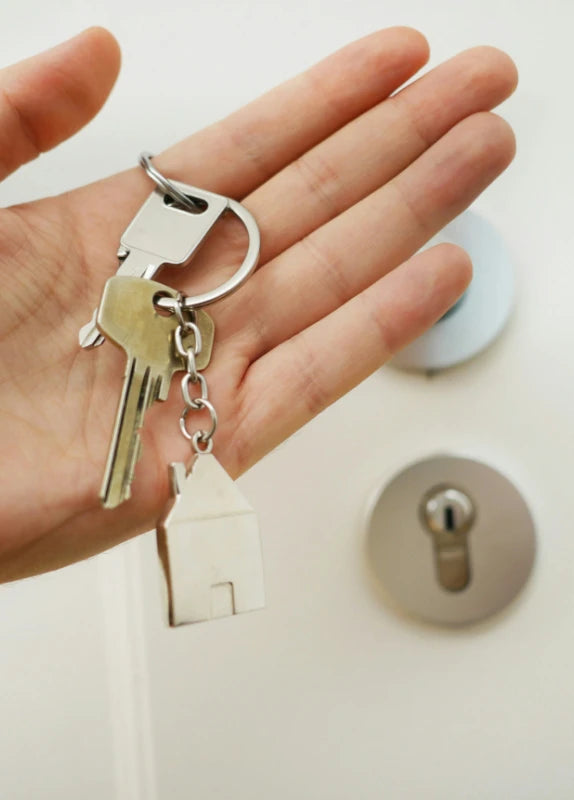 Photo of person holding keys
