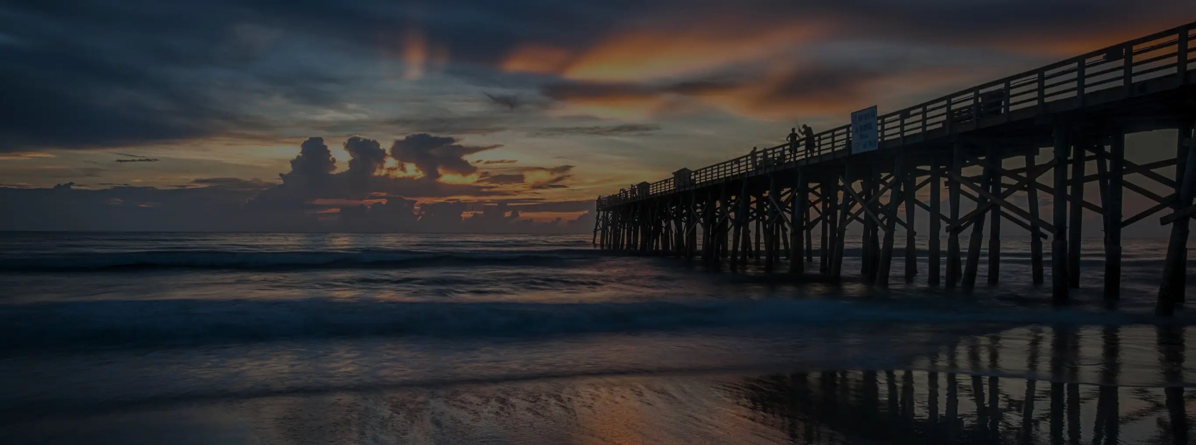 Photograph of dock going into the sea