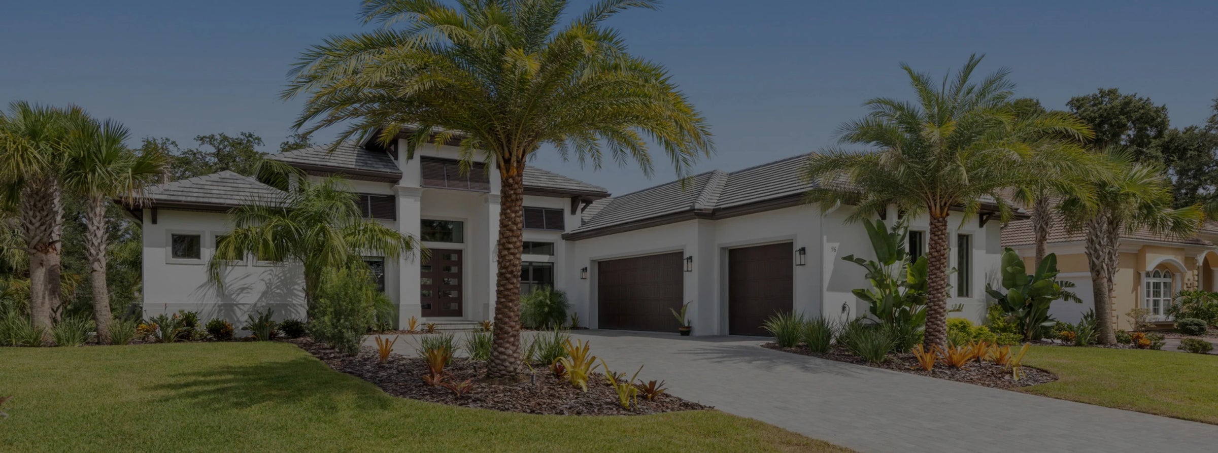 Photo of front elevation of one story ranch style custom home